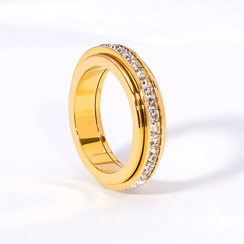 Anillo giratorio de titanio y acero con circonit