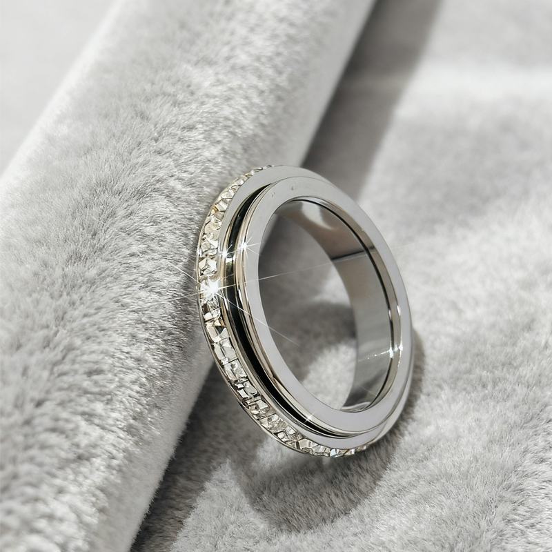 Anillo giratorio de titanio y acero con circonit