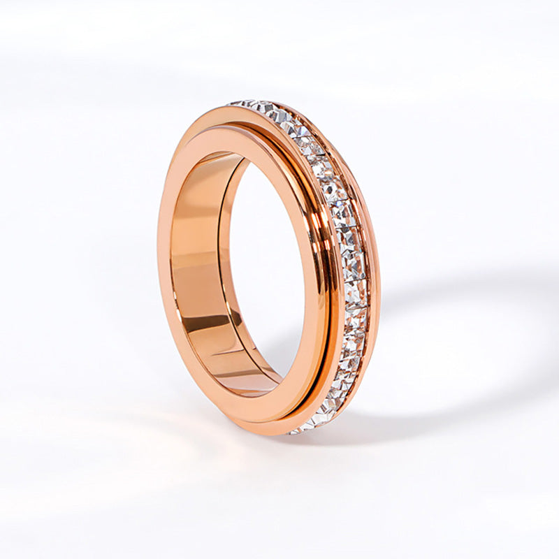 Anillo giratorio de titanio y acero con circonit