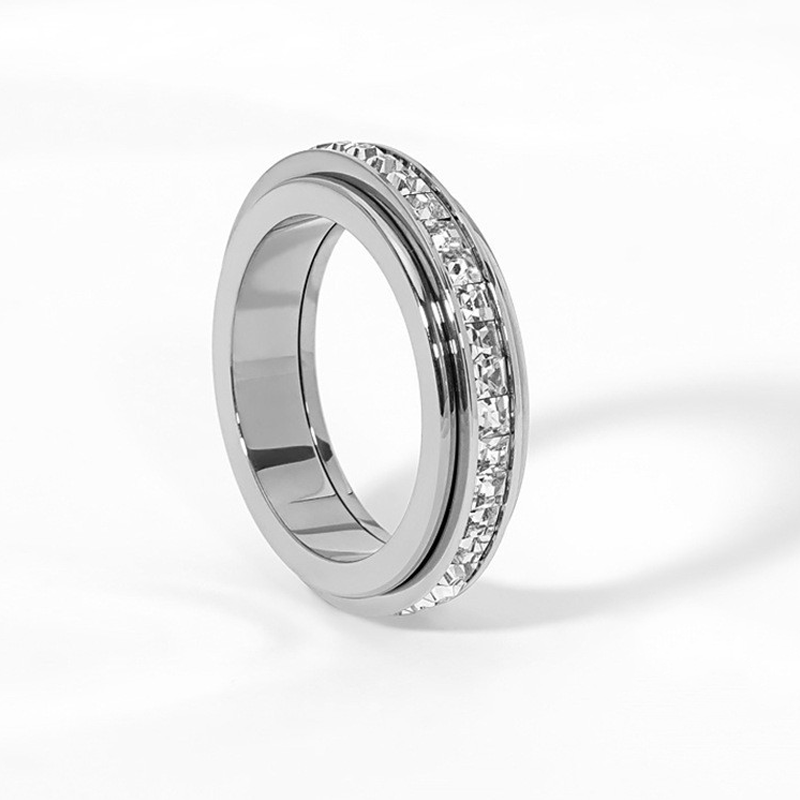 Anillo giratorio de titanio y acero con circonit