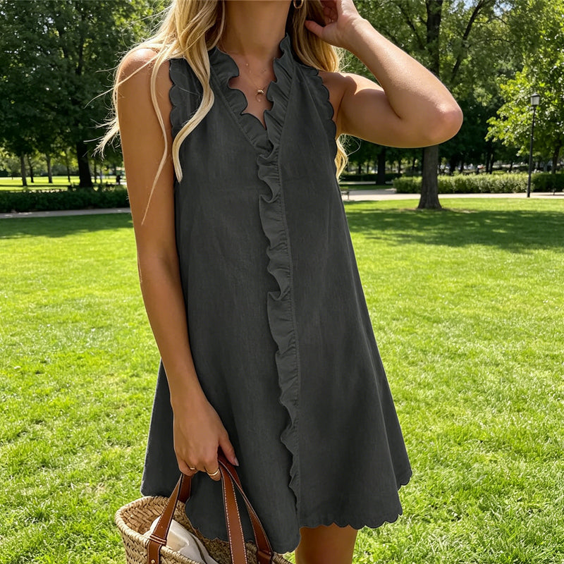 Minivestido para mujer con ribete de volantes y botones al frente