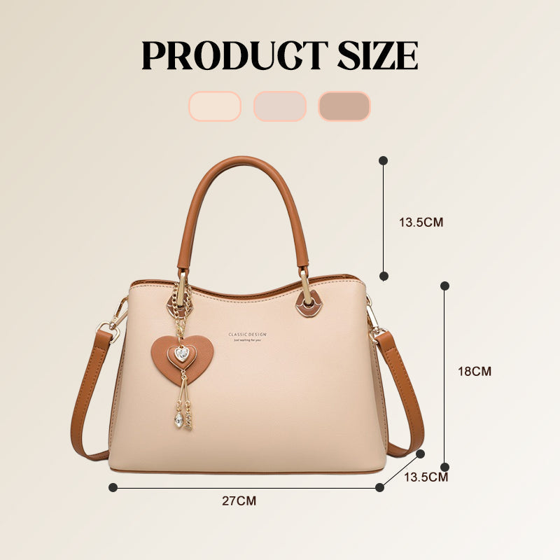 Elegante bolso tote para mujer con dije de corazón brillante