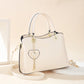 Elegante bolso tote para mujer con dije de corazón brillante