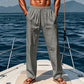 Pantalones de ajuste suelto de lino de moda para hombres con bolsillos