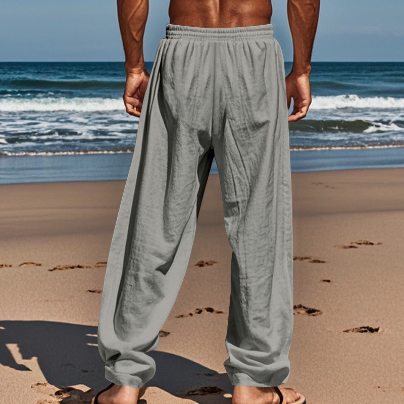 Pantalones de ajuste suelto de lino de moda para hombres con bolsillos