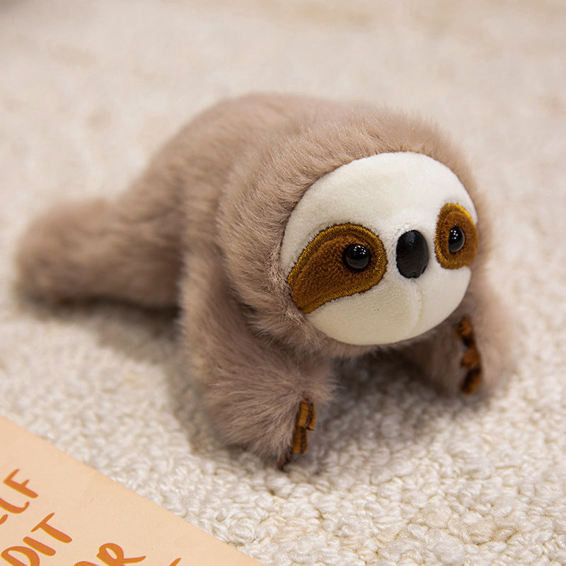 Imán de nevera con muñeca de peluche adorable