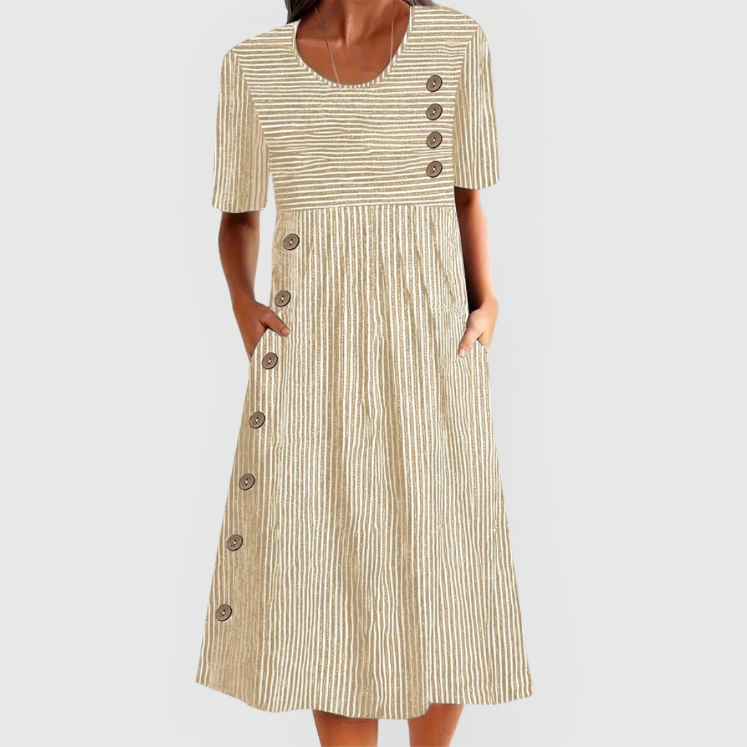🎉🛍️¡Promoción imperdible! 50% de descuento en un vestido midi de rayas atemporal.