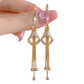 Aretes de Gancho con Borlas Geométricas Elegantes